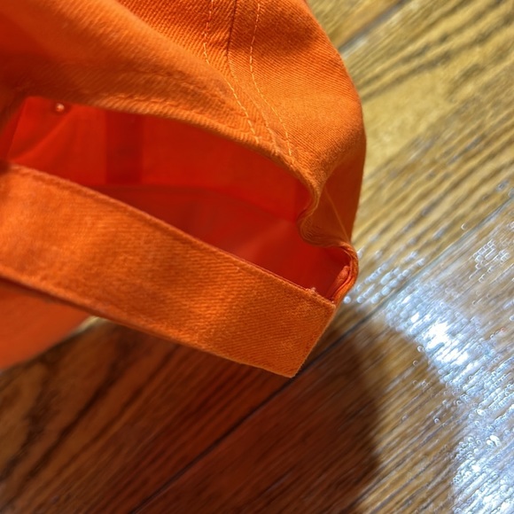 Orange Velcro back cap.  One size.  Embroidery on front. Small stain. - Picture 2 of 5